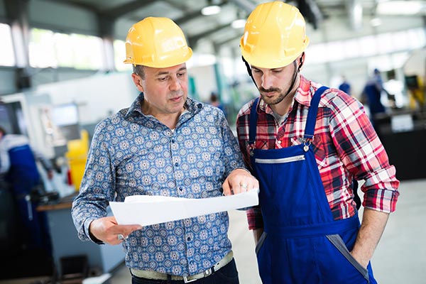 A manager instructing a worker